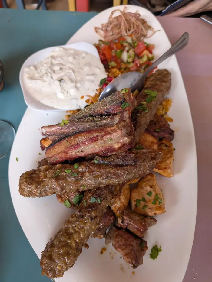 Pera special mixed grill — köfte, şiş, ribs with cacık and bulgur