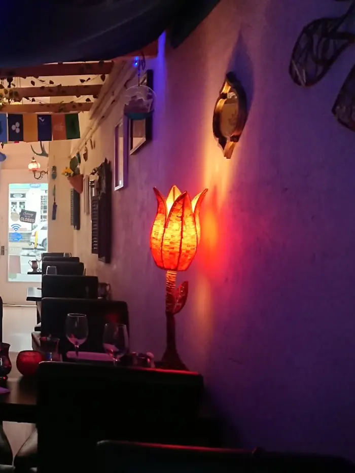 The glowing tulip lamp in Pera's dining room